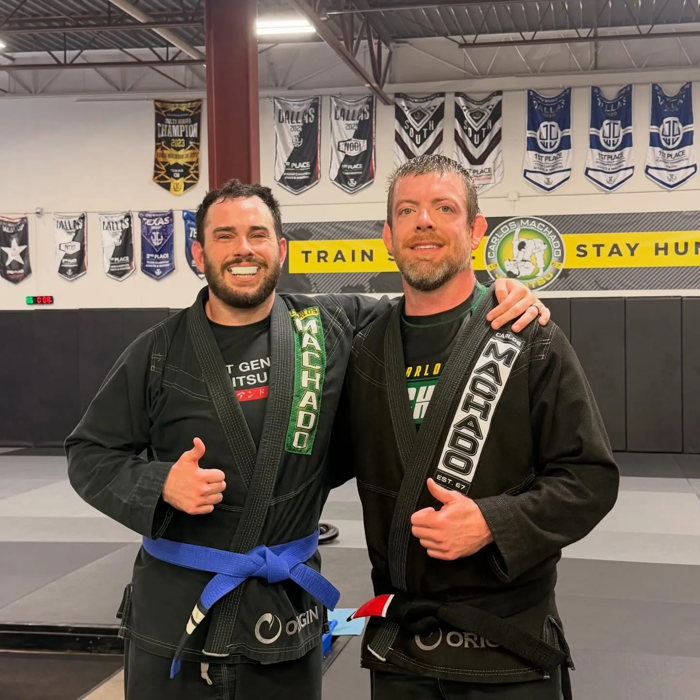 An adult Machado Method student rolling during a Brazilian Jiu-Jitsu class in Carrollton, TX