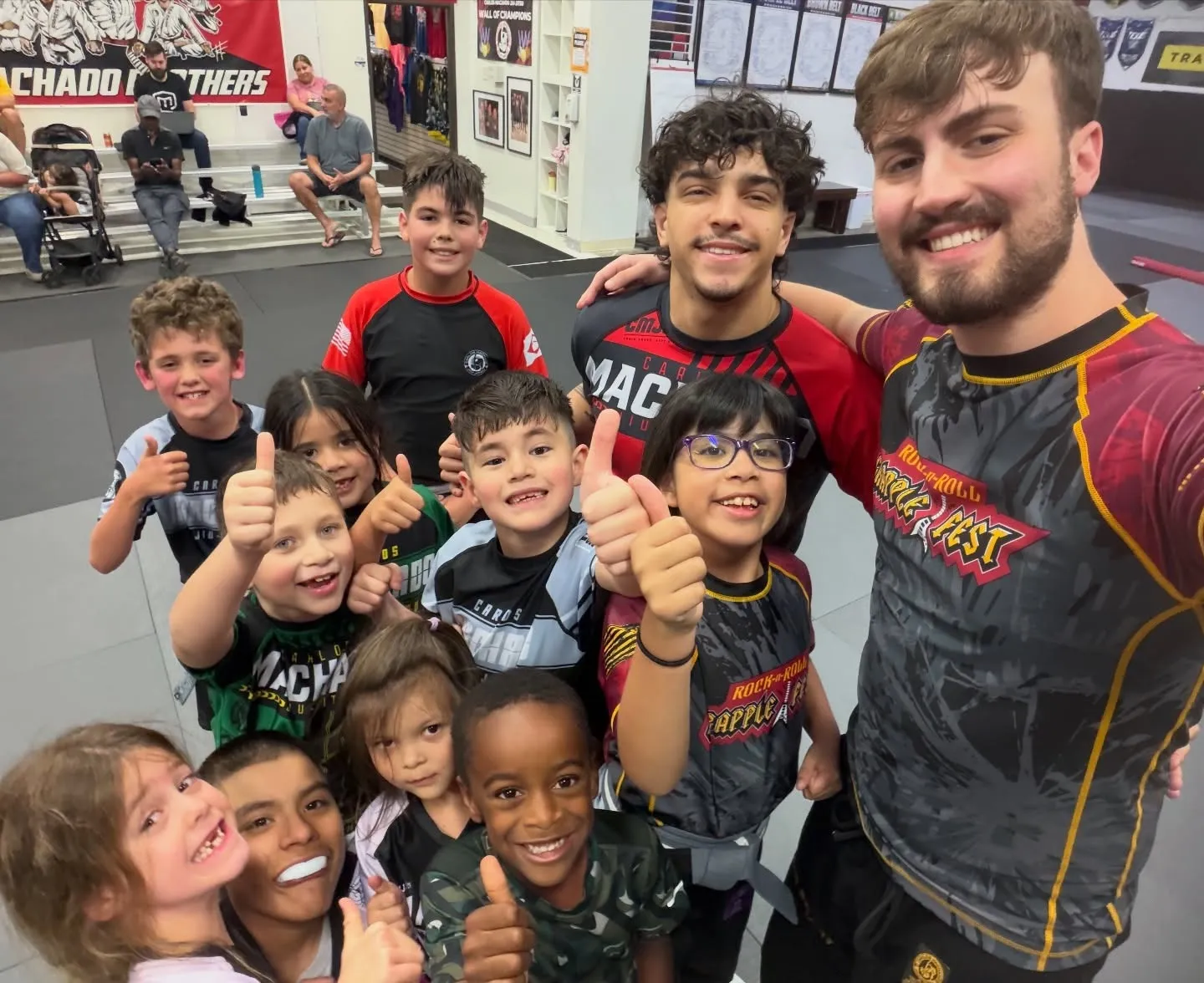 Machado Method kids practicing grappling control on the mat in Carrollton, TX