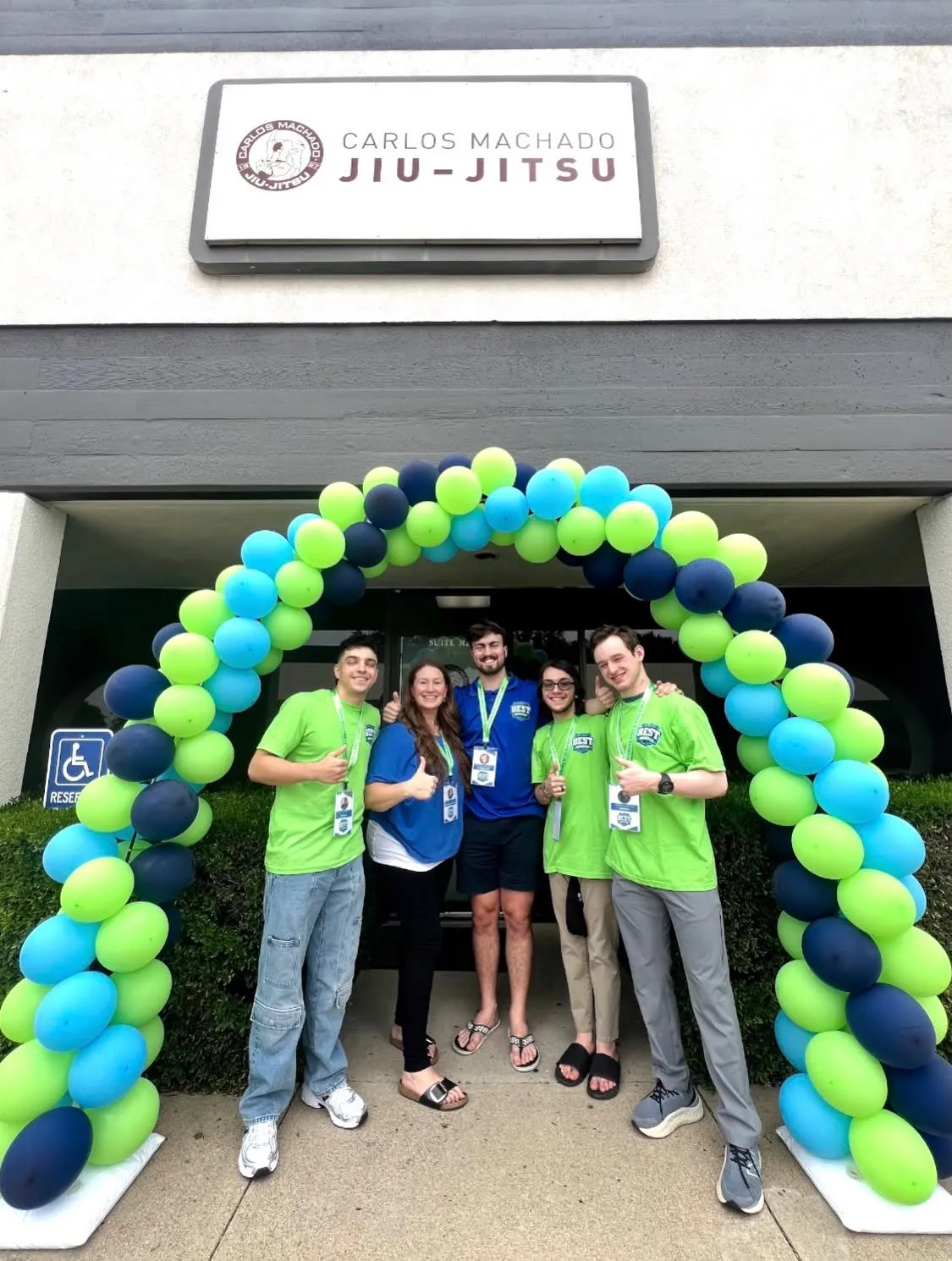 The Machado Method Jiu-Jitsu academy entrance in Carrollton, TX decorated for a summer event
